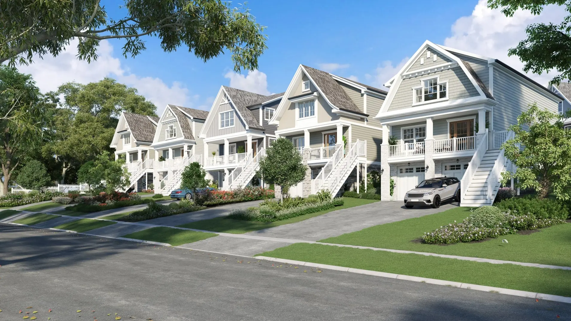 Rendering of Laurel Crossing's Laurel Avenue side in Madeira: a row of grey and white shingle-style townhomes with raised front porches, white stairs and street-level garages